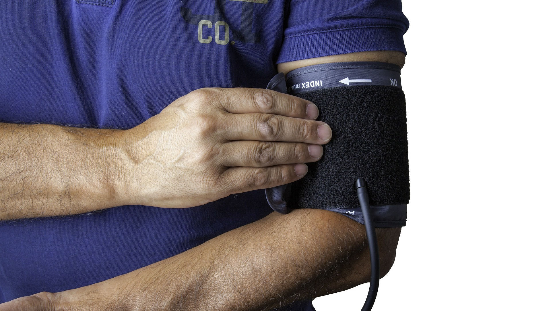 Man with blood pressure cuff.
