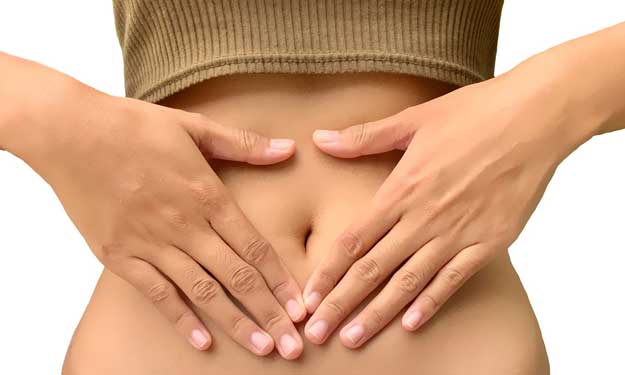 Woman holding stomach