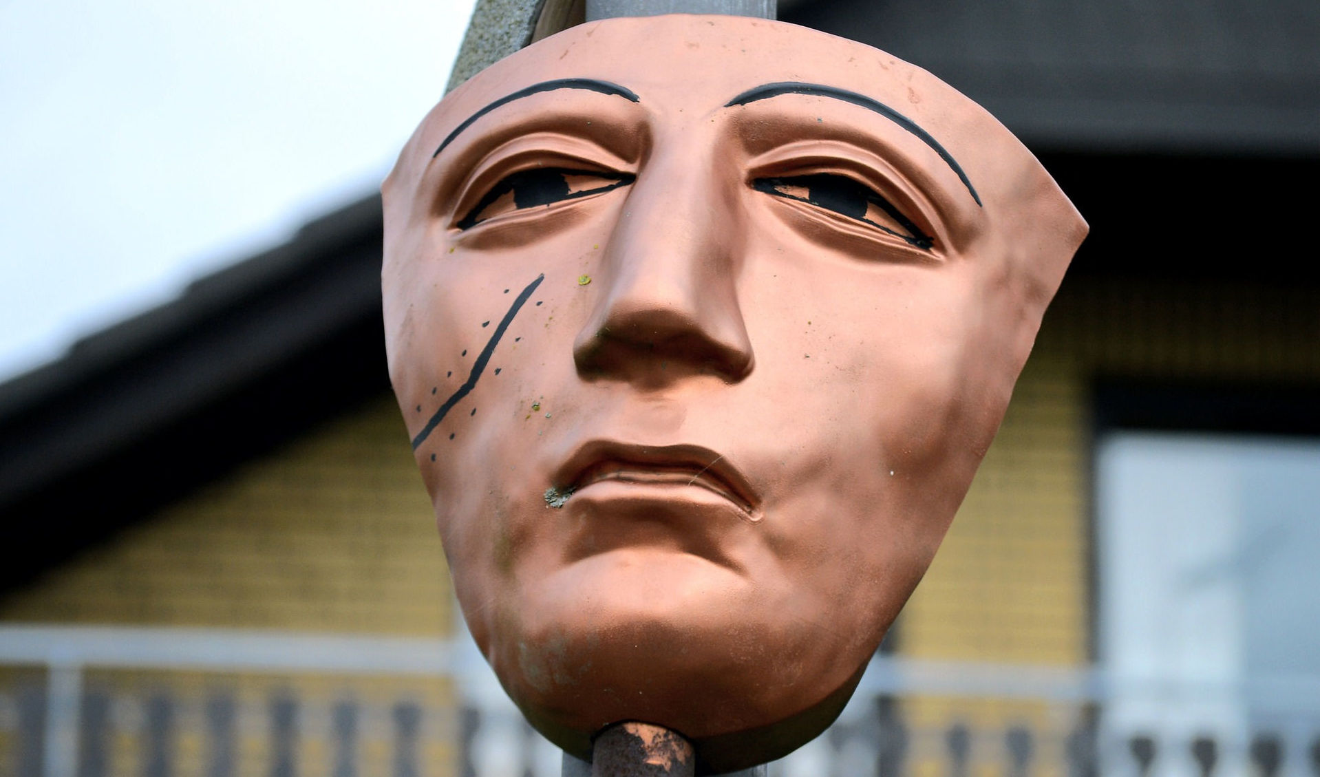 Face mask with a painted scar