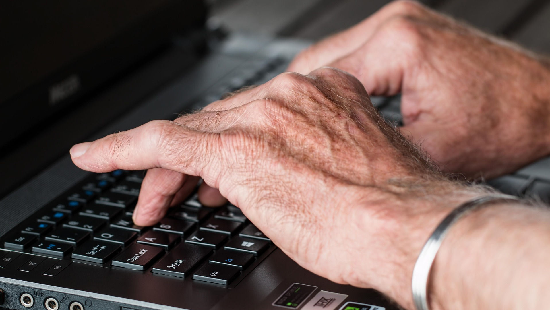 Old hands typing