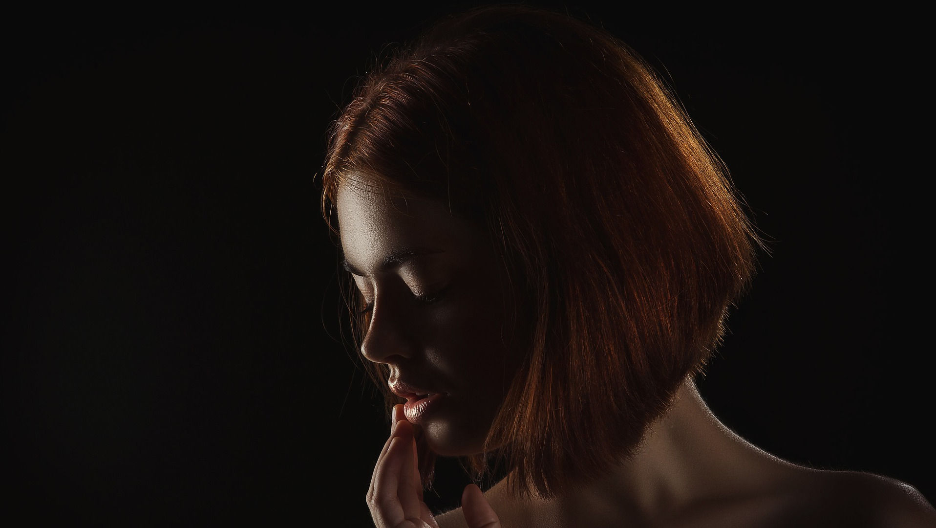 Woman's face in the shadows